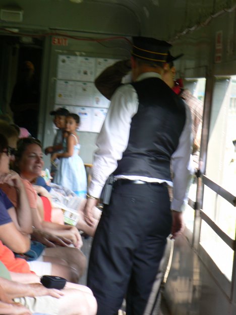 041-conductor talking with suspicious character.jpg